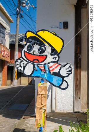 The old signboard of caution popping out The old signboard of caution popping out 44239842