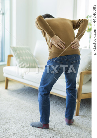 Middle-aged man backache 44240095