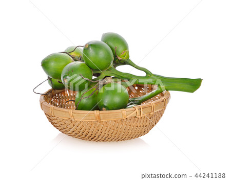 bunch of betel nuts in bamboo basket on white bunch of betel nuts in bamboo basket on white 44241188