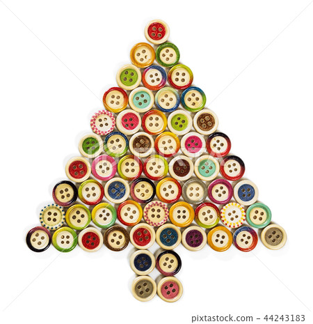 Christmas tree made up of wooden carved buttons Christmas tree made up of wooden carved buttons 44243183
