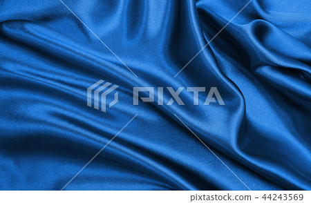 Smooth elegant blue silk or satin luxury cloth Smooth elegant blue silk or satin luxury cloth 44243569