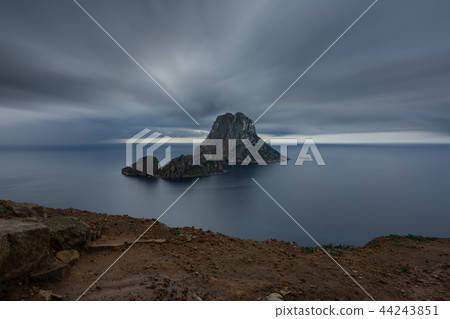 Clouds over the mysterious island of Es Vedra, ultra long exposure Clouds over the mysterious island of Es Vedra, ultra long exposure 44243851