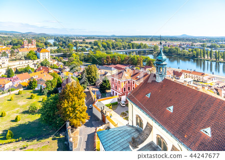 Aerial view of Litomerice and Labe River from cathedral bell tower on sunny summer day, Czech 44247677