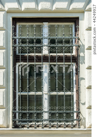 Window with bars. Window with bars. 44249917