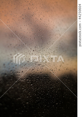 Abstract background, raindrops on window Abstract background, raindrops on window 44250604