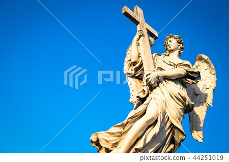 Catholic angel with cross Catholic angel with cross 44251019