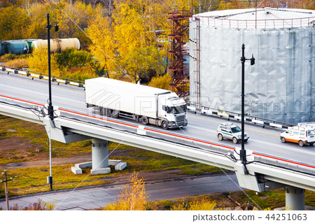 White truck on a bridge 44251063