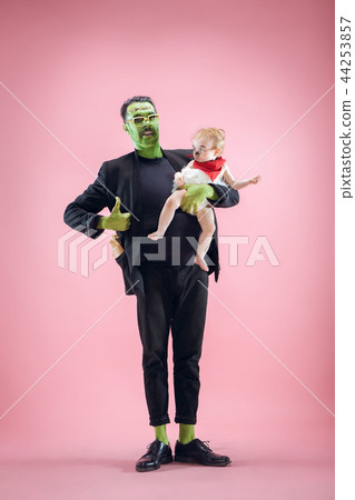 Halloween Family. Happy Father and Children Girl in Halloween Costume and Makeup Halloween Family. Happy Father and Children Girl in Halloween Costume and Makeup 44253857