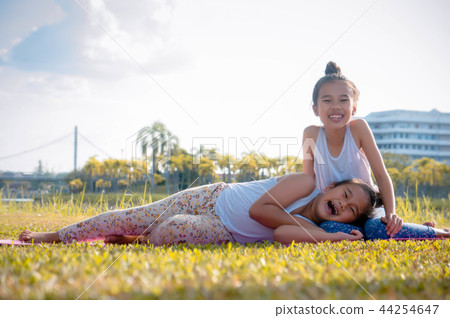 sister friendship two girl's Happy laugh  44254647