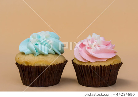 sweet cup cake dessert on yellow background sweet cup cake dessert on yellow background 44254690