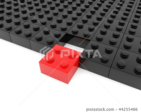 Black toy blocks with a red block in the foregroun 44255466