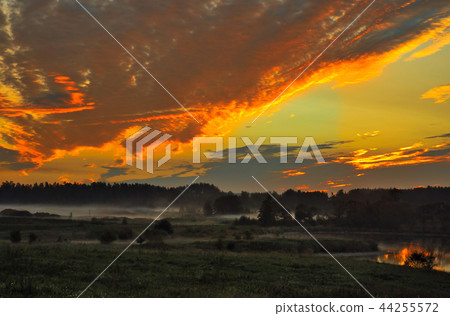 Red sunrise over the meadows Red sunrise over the meadows 44255572