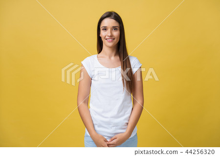 beautiful young woman with long hair wearing white t-shirt. beautiful young woman with long hair wearing white t-shirt. 44256320