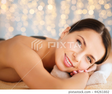 beautiful woman having hot stone therapy at spa beautiful woman having hot stone therapy at spa 44261802