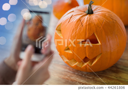 close up of jack-o-lantern or halloween pumpkin close up of jack-o-lantern or halloween pumpkin 44261806