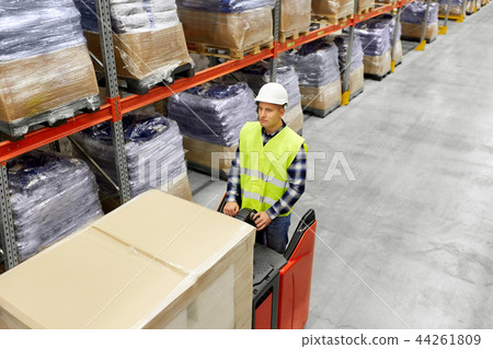 loader operating forklift at warehouse loader operating forklift at warehouse 44261809