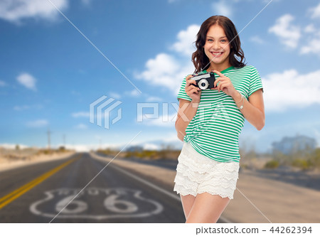 teenage girl with vintage film camera on route 66 44262394