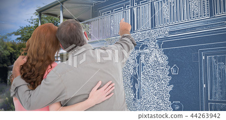 Composite image of casual couple pointing and looking Composite image of casual couple pointing and looking 44263942