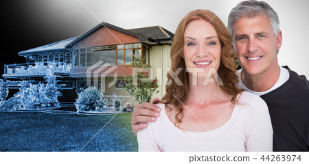 Composite image of casual couple smiling at camera 44263974