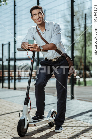 Confident happy guy driving to meeting point Confident happy guy driving to meeting point 44264173