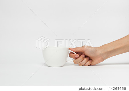hand sign posture hold coffee cup in isolated 44265666