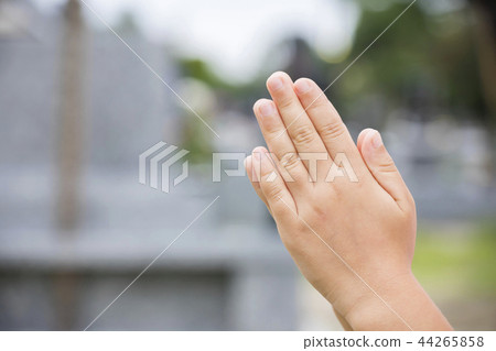 Going to the grave and child hand image 44265858