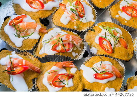 Thai steamed red curry cake  with seafood. 44267756