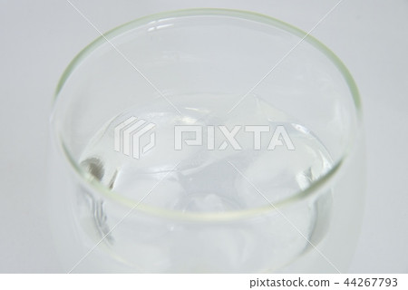 Glass of ice and liquid Glass of ice and liquid 44267793
