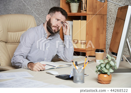 Frustrated businessman Frustrated businessman 44268522