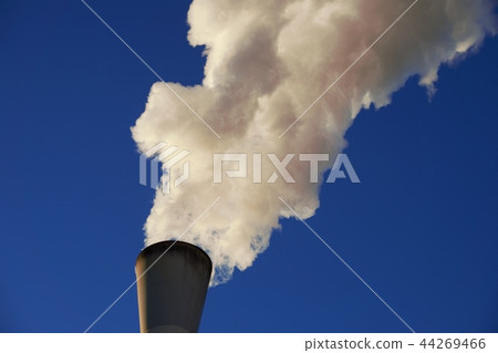 Smoke coming out of industrial chimney 44269466