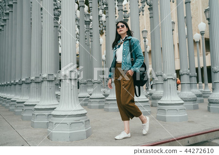 woman wearing jean jacket with neckerchief woman wearing jean jacket with neckerchief 44272610