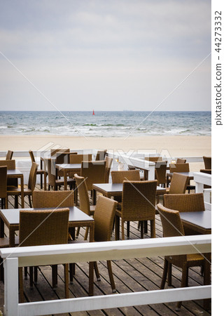 Outdoor cafe on beach Outdoor cafe on beach 44273332