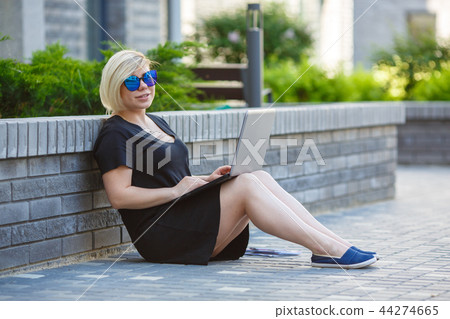 young woman freelancing with laptop, realtor young woman freelancing with laptop, realtor 44274665
