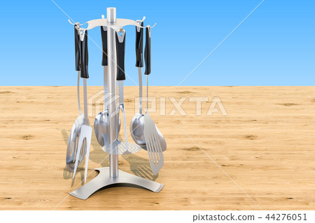 Kitchen utensils with stand on the wooden table 44276051