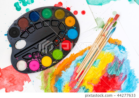Watercolor palette, brushes and paper Watercolor palette, brushes and paper 44277633