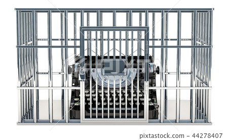 Typewriter inside cage, prison cell 44278407