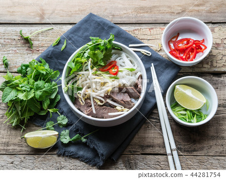 Traditional Vietnamese soup- pho in a white bowl 44281754