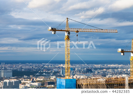 crane at construction site of skyscraper in Moscow crane at construction site of skyscraper in Moscow 44282385