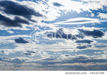 dark blue clouds in sunset sky in autumn 44282386