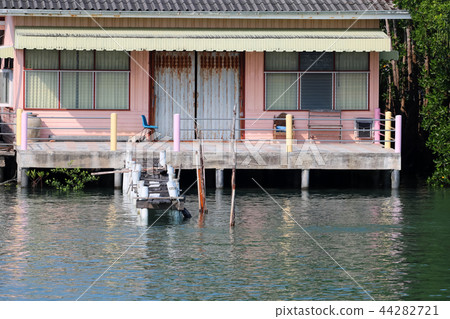House of fishermen along the river near the sea House of fishermen along the river near the sea 44282721