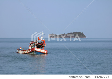 Wreckage wooden fishing boat broken near the beach Wreckage wooden fishing boat broken near the beach 44282774
