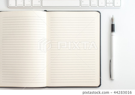 white table notepad, keyboard and fountain pen white table notepad, keyboard and fountain pen 44283016