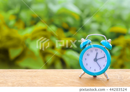 The blue alarm clock indicates the beginning The blue alarm clock indicates the beginning 44283524