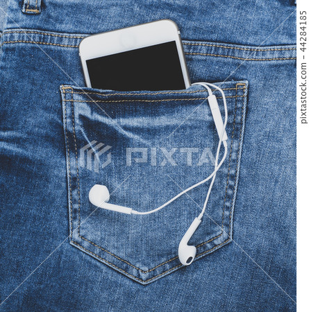 smartphone with headphones in the back pocket  44284185