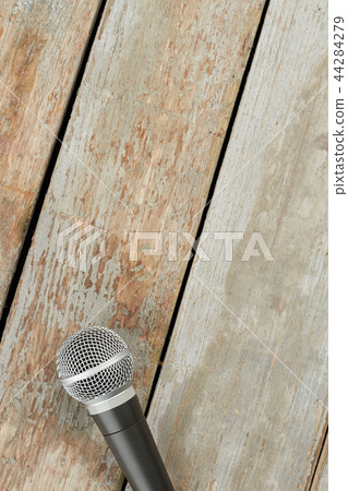 Microphone on wooden background and text space. Microphone on wooden background and text space. 44284279
