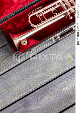 Trumpet in box and copy space. 44284877