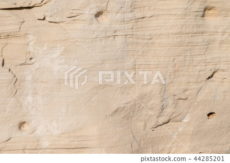Natural limestone background textured rock face wallpaper Natural limestone background textured rock face wallpaper 44285201