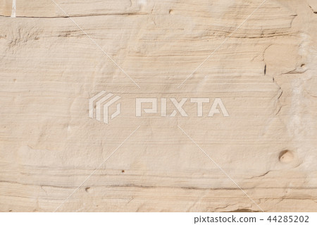 Natural limestone background textured rock face wallpaper Natural limestone background textured rock face wallpaper 44285202