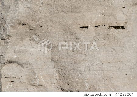Natural limestone background textured rock face wallpaper Natural limestone background textured rock face wallpaper 44285204