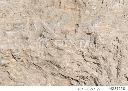 Natural limestone background textured rock face wallpaper Natural limestone background textured rock face wallpaper 44285238